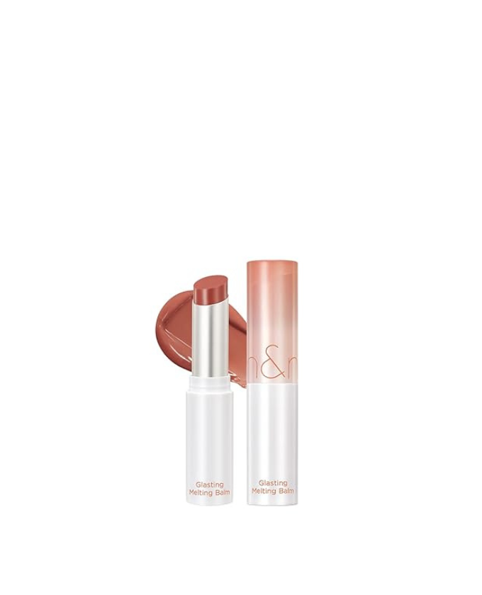 rom&nd Glasting Balm in shade 05 Nuga Sand on white background. Moisturizing Korean lip balm with a soft nude tint for everyday natural lip makeup. Authentic rom&nd lip product available at Sejou Lebanon.